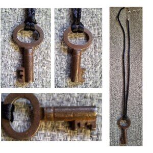 Vintage key on black ribbon necklace